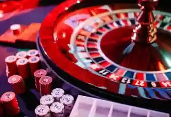 Mobile phone showing fb77 casino interface for Filipino players